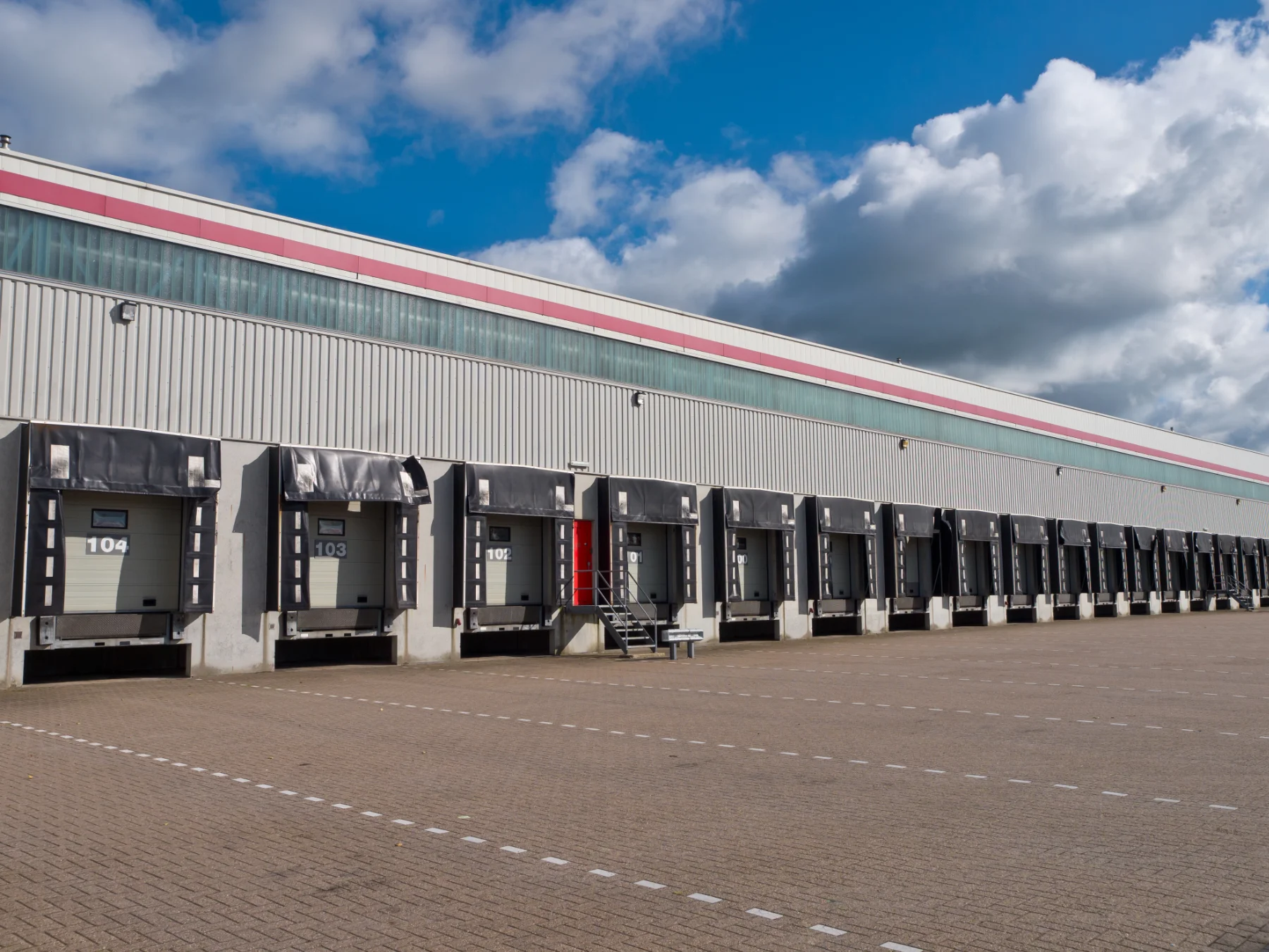 loading-docks-at-a-large-industrial-building-2026-03-24-09-50-26-utc